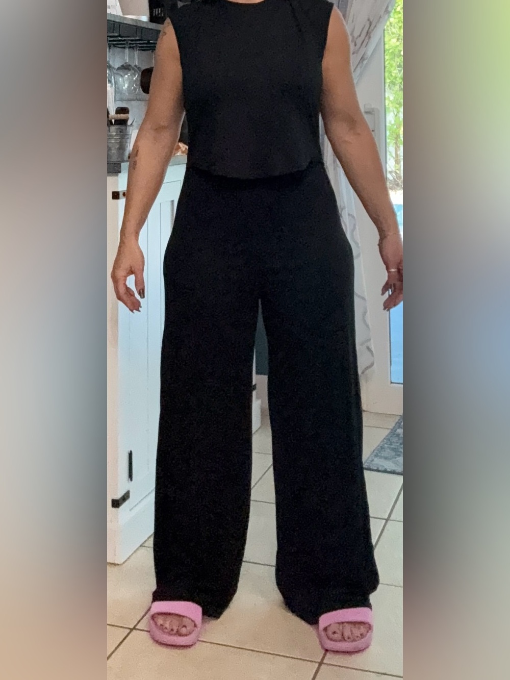 Black Wide-Leg woman’s 1 piece romper sz L